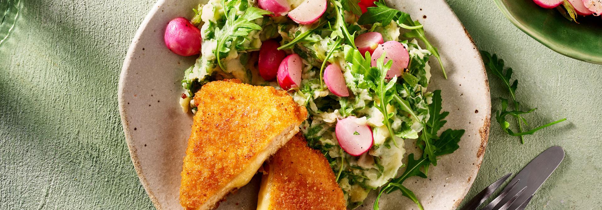 Voorjaars rucolastamppot met Kaasschnitzel