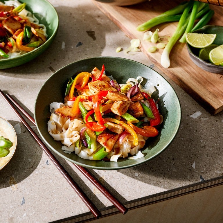 Vegetable noodle stir-fry with vegan fillet pieces